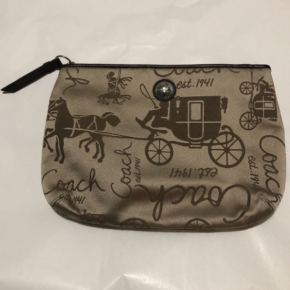 Coach embroidered wristlet NWT